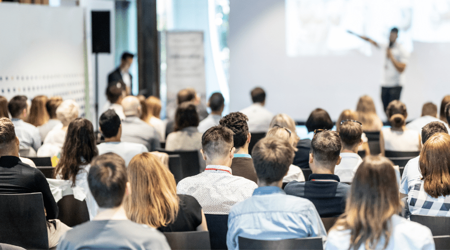 People attend a coference.