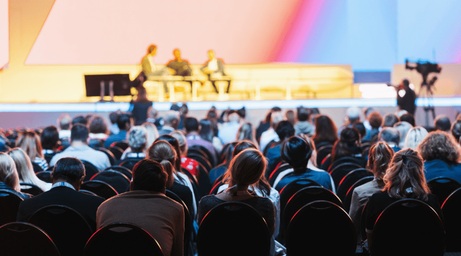 People attend a conference.