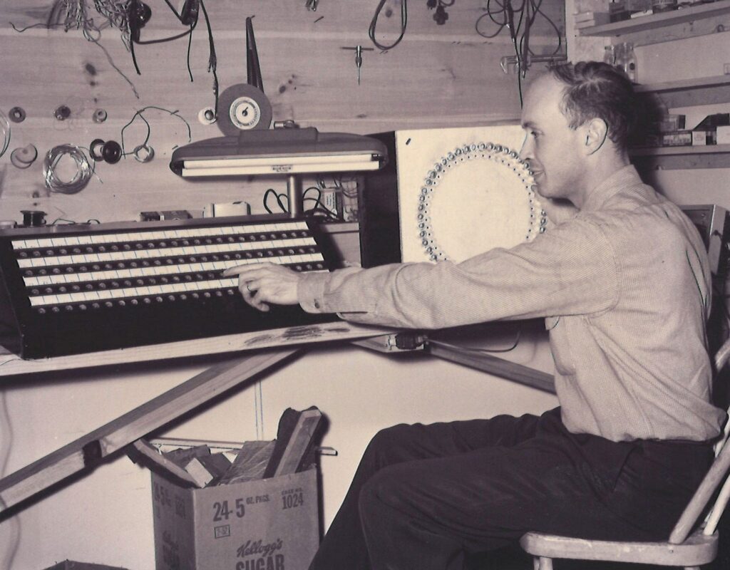 Bill Curtin inventing telecommunications equipment.