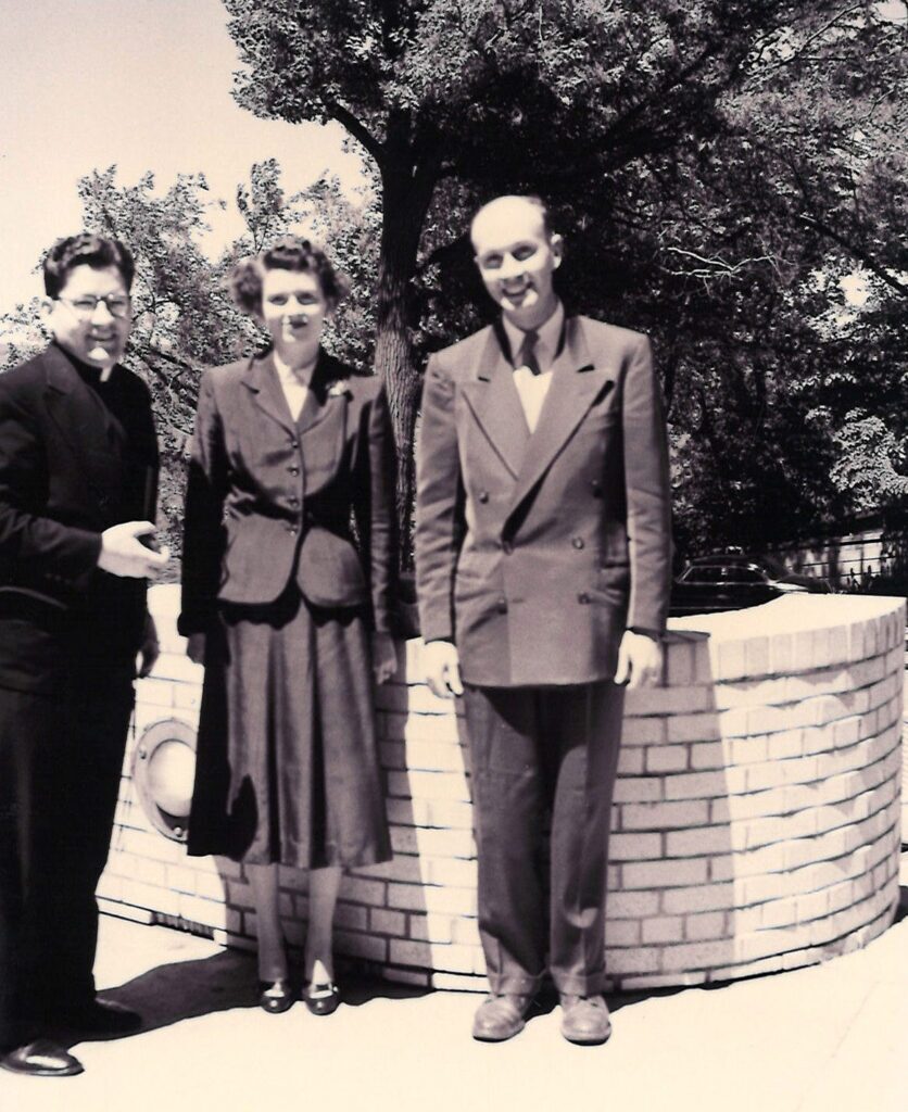 Mr. and Mrs. C with family friend Fr. Christopher Fuller who worked with Mr. C on patent research.