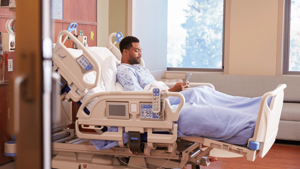 A patient lays in a hospital bed.