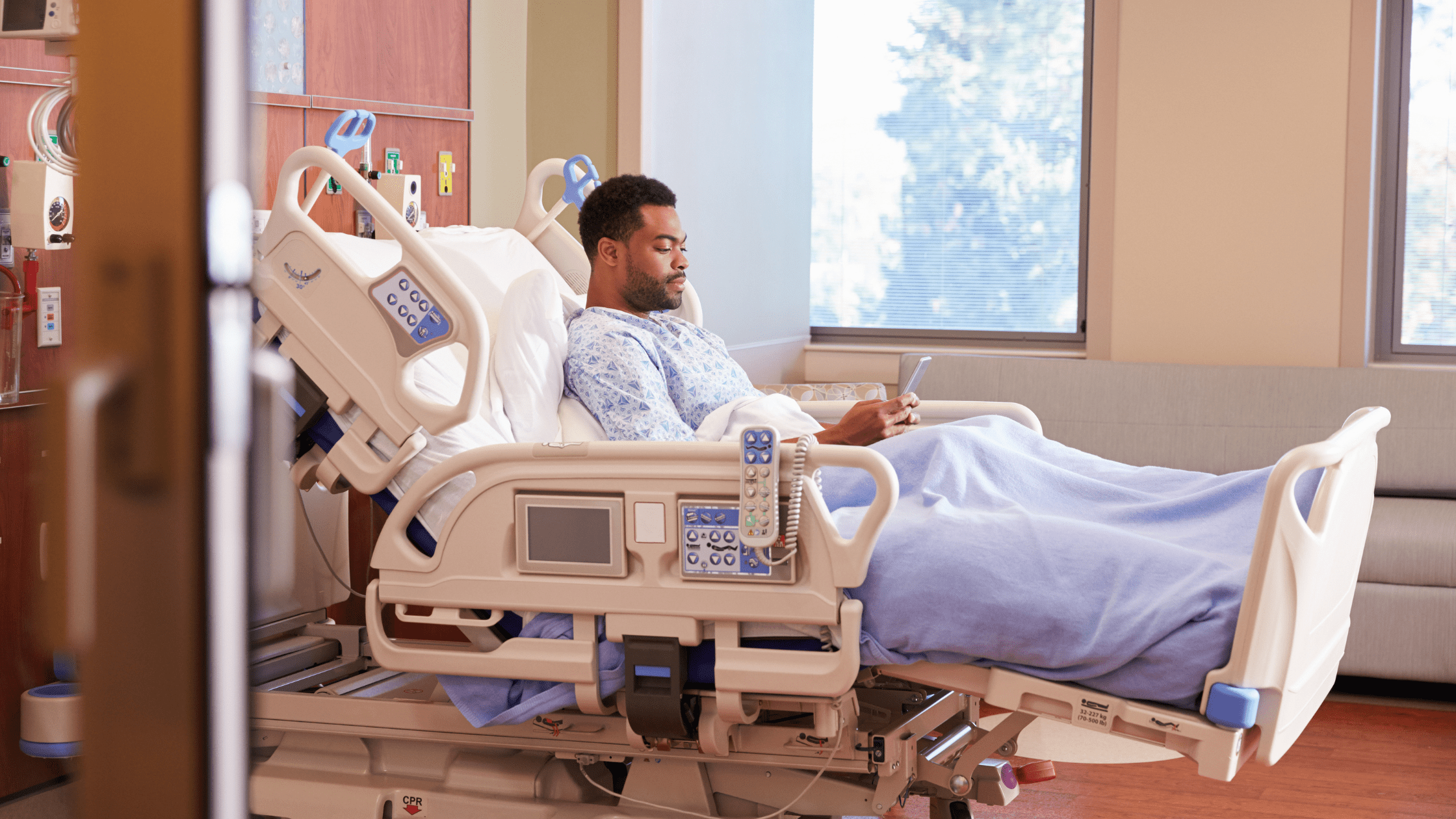 A patient lays in a hospital bed.