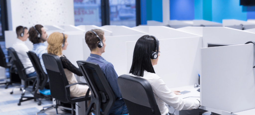 A group of call center operators at work.