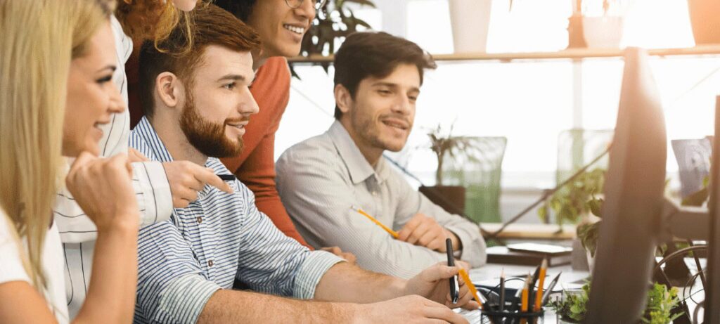 Team of employees working on call center software implementation project