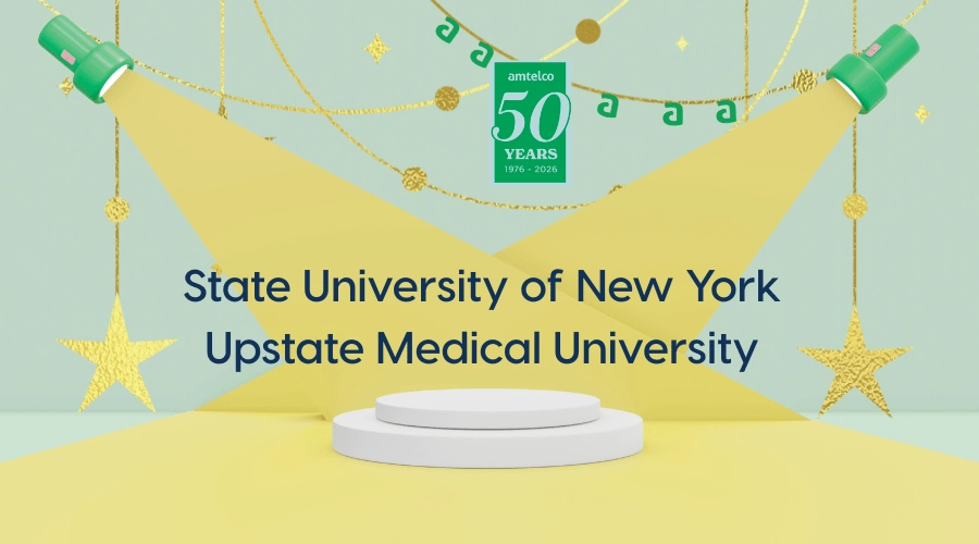 A spotlight shines on the words State University of New York Upstate Medical University.