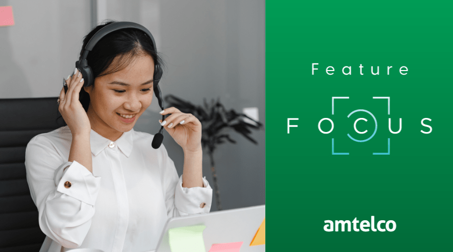 A call center agent listens to a voice call logger.