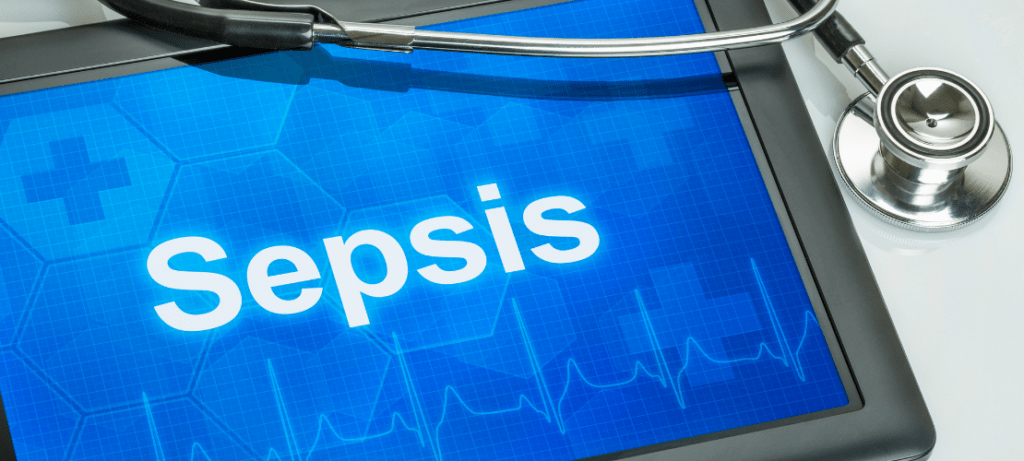 The word "sepsis" appears on a doctor's tablet.