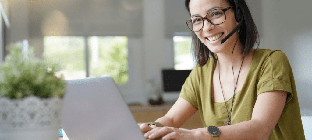 A contact center operator works from home.