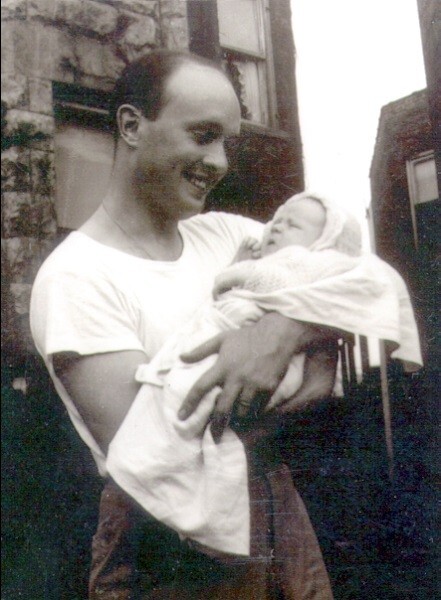 Amtelco founder Bill Curtin with baby.