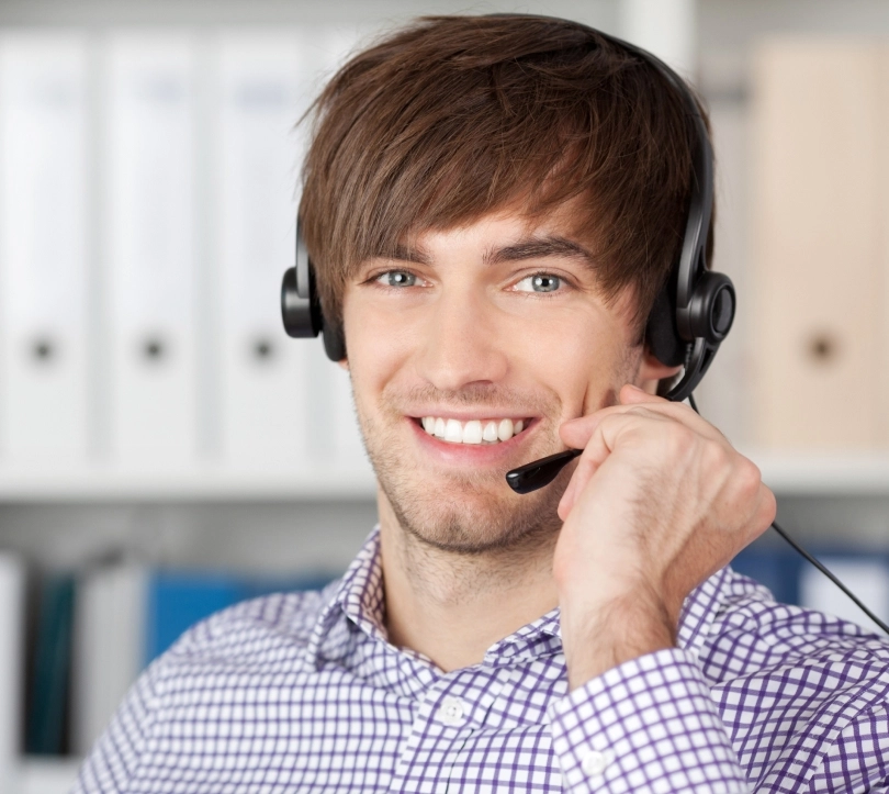 Call center agent taking call for physician answering service