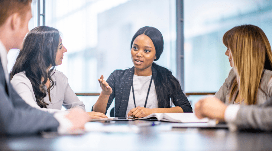 A call center manager meets with hospital leadership.
