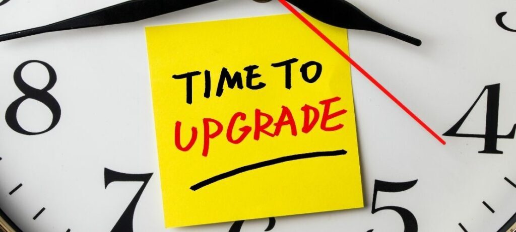 Clock with yellow note 'Time to Upgrade' call center software