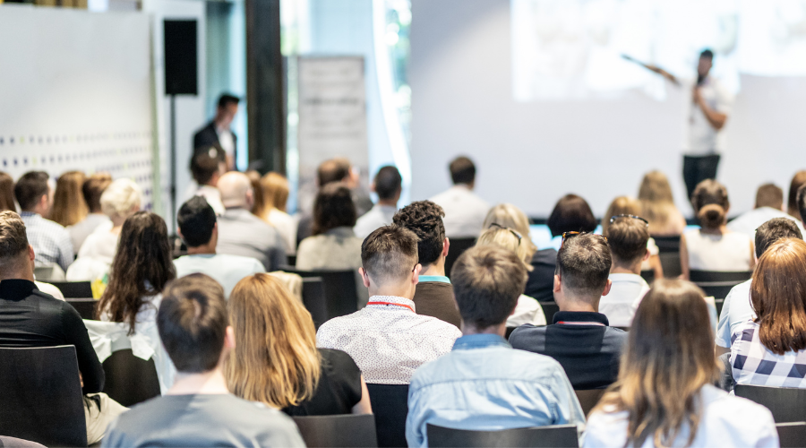 People attend a coference.