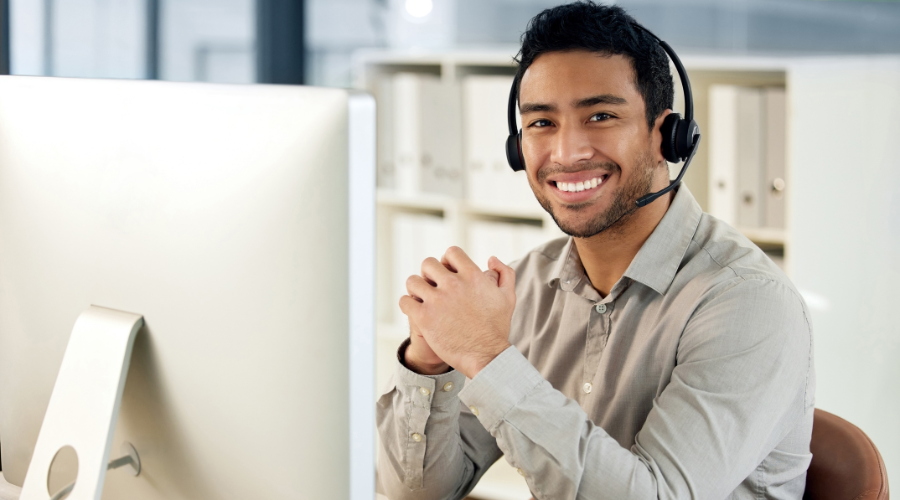 A smiling switchboard agent.